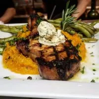 Breakfast Menu Pork Chops (Papa Joe’s) with Eggs price